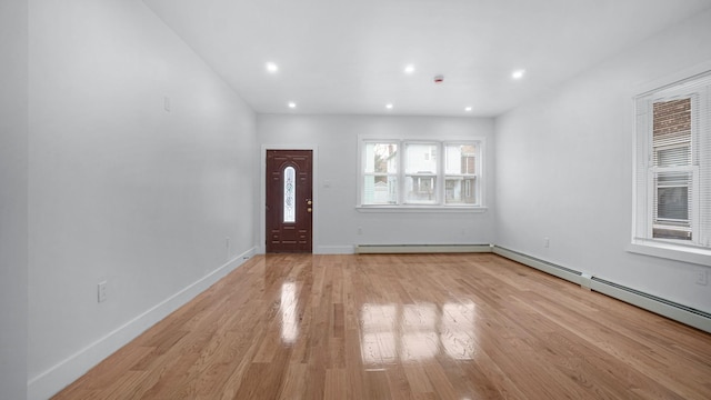 2825 Wellman Ave, Bronx, NY 10461 - foyer entrance with light wood-style flooring, a baseboard radiator, baseboards, and recessed lighting