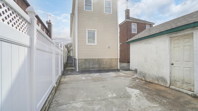 2825 Wellman Ave, Bronx, NY 10461 - rear view of house with a patio area