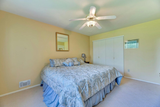 276 Dockside Ct, Moriches, NY 11955 - bedroom with light colored carpet, baseboards, a closet, and ceiling fan