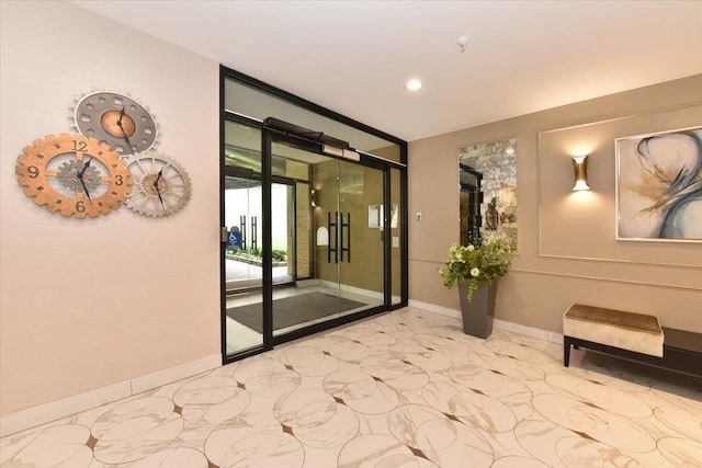 40 Stoner Ave Unit 1-I, Great Neck, NY 11021 - community lobby featuring recessed lighting