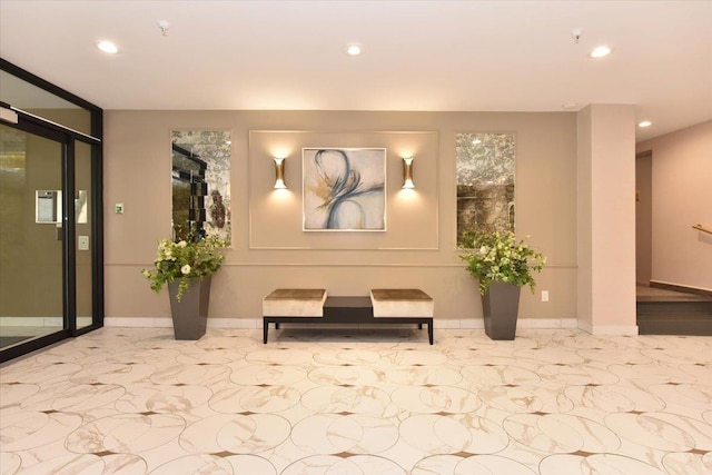 40 Stoner Ave Unit 1-I, Great Neck, NY 11021 - building lobby featuring recessed lighting