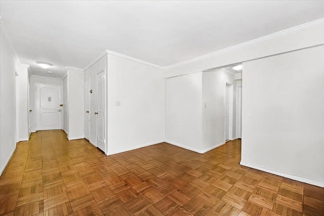 40 Stoner Ave Unit 1-I, Great Neck, NY 11021 - spare room with baseboards and ornamental molding