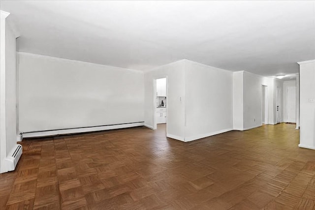 40 Stoner Ave Unit 1-I, Great Neck, NY 11021 - unfurnished room featuring a baseboard heating unit and a baseboard radiator