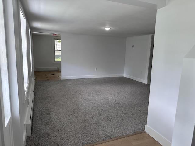 19 N Rd, Highland, NY 12528 - empty room featuring a baseboard radiator, carpet flooring, and baseboards
