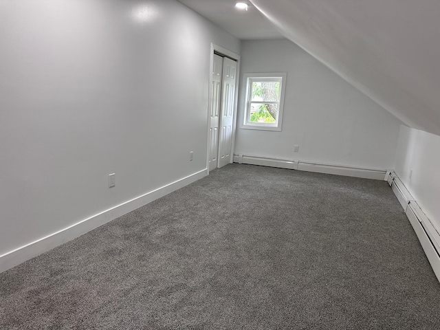 19 N Rd, Highland, NY 12528 - bonus room featuring vaulted ceiling, dark colored carpet, baseboard heating, and baseboards
