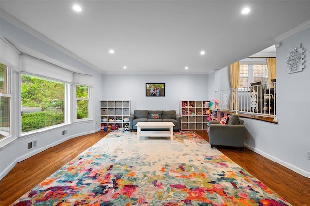 71 Harlan Dr, New Rochelle, NY 10804 - living area featuring crown molding, wood finished floors, and recessed lighting