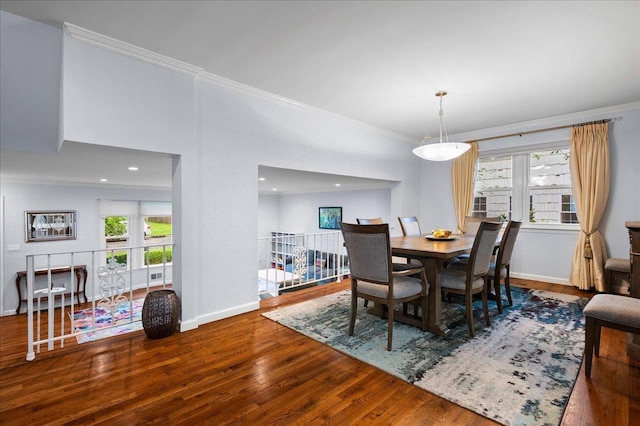 71 Harlan Dr, New Rochelle, NY 10804 - dining space featuring wood finished floors, crown molding, and recessed lighting