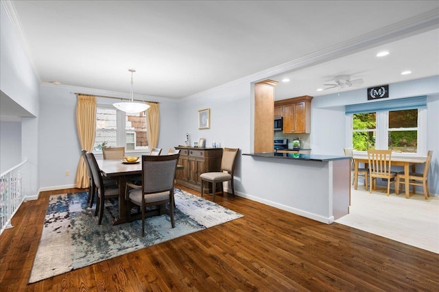 71 Harlan Dr, New Rochelle, NY 10804 - dining space featuring wood finished floors, crown molding, recessed lighting, and ceiling fan