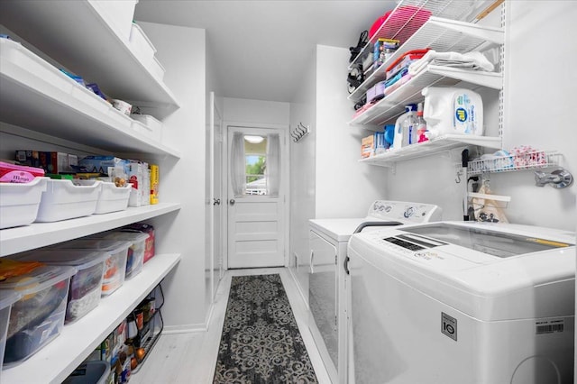 71 Harlan Dr, New Rochelle, NY 10804 - laundry room featuring washing machine and dryer and baseboards