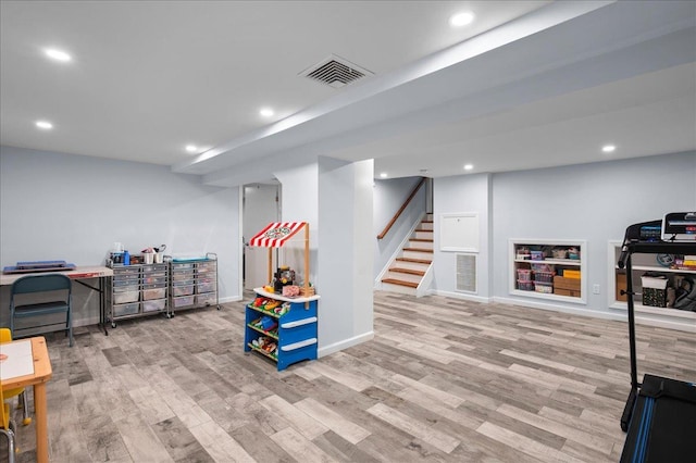 71 Harlan Dr, New Rochelle, NY 10804 - recreation room with wood finished floors and recessed lighting