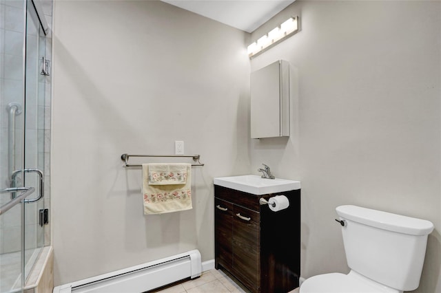 14 Wainscott Ln, East Setauket, NY 11733 - full bath with baseboard heating, vanity, toilet, a tile shower, and tile patterned flooring