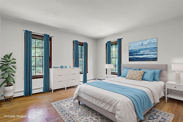 14 Wainscott Ln, East Setauket, NY 11733 - bedroom with wood finished floors