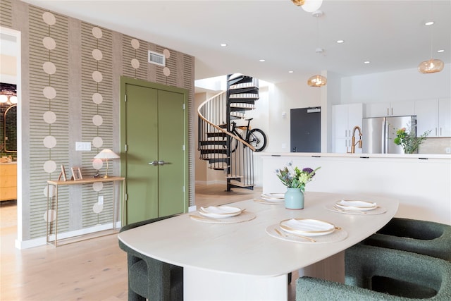 249 Main St Unit 401, Beacon, NY 12508 - dining area with stairway, light wood-style flooring, and recessed lighting