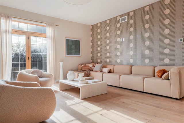 249 Main St Unit 401, Beacon, NY 12508 - living room with light wood-style flooring and an accent wall