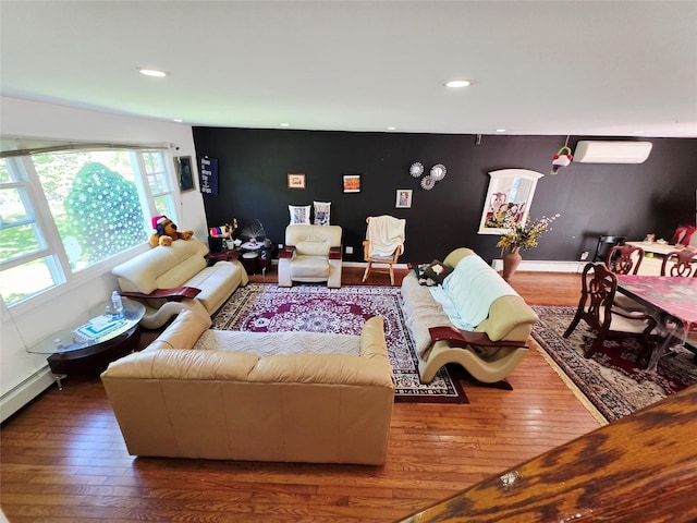 81 Anchor St, Riverhead, NY 11901 - living room featuring hardwood / wood-style flooring, a wall mounted air conditioner, recessed lighting, and an accent wall