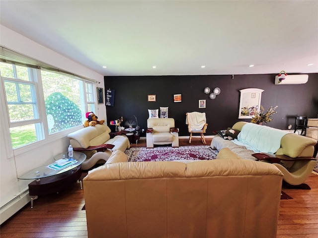 81 Anchor St, Riverhead, NY 11901 - living room featuring an accent wall, hardwood / wood-style floors, a wall unit AC, baseboard heating, and recessed lighting