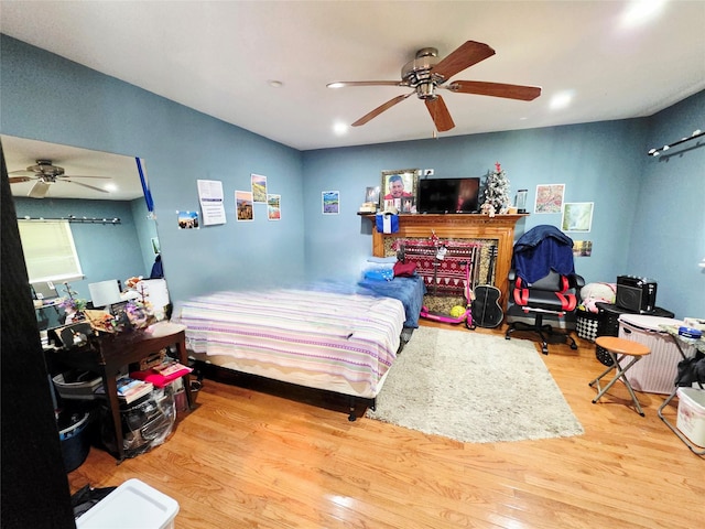 81 Anchor St, Riverhead, NY 11901 - bedroom featuring wood finished floors and ceiling fan