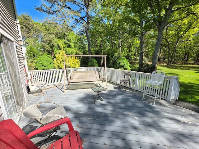 81 Anchor St, Riverhead, NY 11901 - wooden terrace featuring view of wooded area