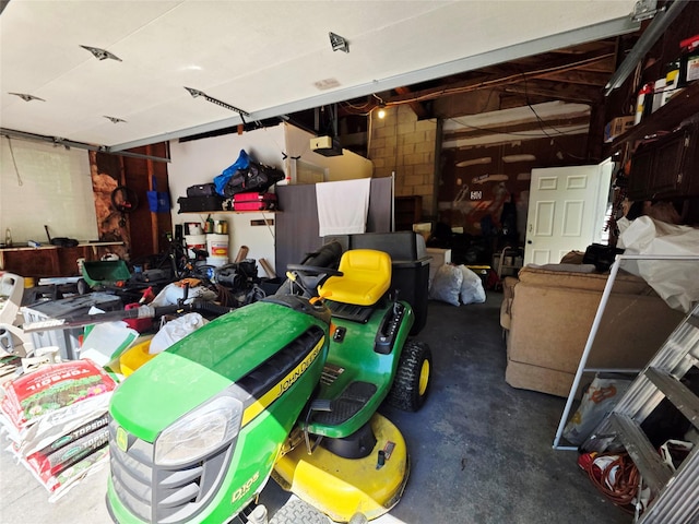81 Anchor St, Riverhead, NY 11901 - garage featuring a garage door opener