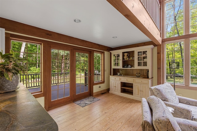 577 Fiddlers Bridge Rd, Staatsburg, NY 12580 - living room with plenty of natural light, french doors, and light wood-style floors