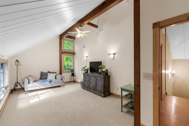 577 Fiddlers Bridge Rd, Staatsburg, NY 12580 - living room with a ceiling fan, carpet, baseboards, beam ceiling, and high vaulted ceiling