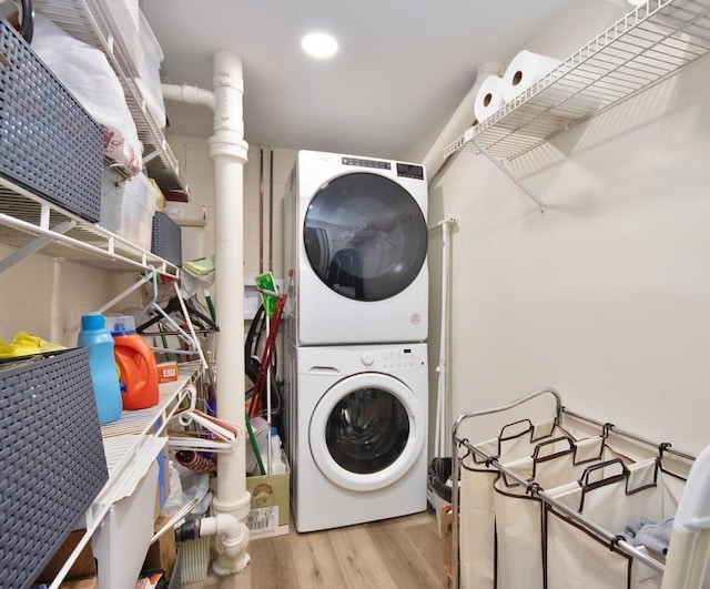 95 Charter Cir Unit 95, Ossining, NY 10562 - laundry room featuring stacked washer / drying machine, wood finished floors, and recessed lighting