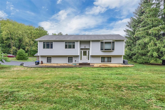 6 Emily Ln, Monroe, NY 10950 - raised ranch with a front lawn and central air condition unit