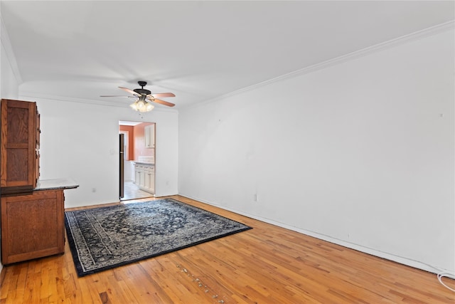 32 Pearsall Unit 3B, Glen Cove, NY 11542 - empty room featuring ceiling fan, light wood-type flooring, crown molding, and baseboards