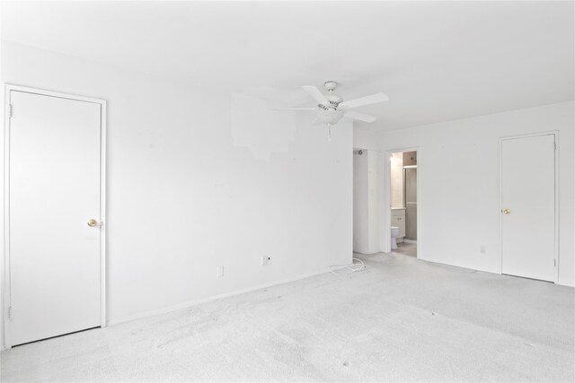 32 Pearsall Unit 3B, Glen Cove, NY 11542 - unfurnished bedroom featuring light colored carpet, ensuite bathroom, and ceiling fan