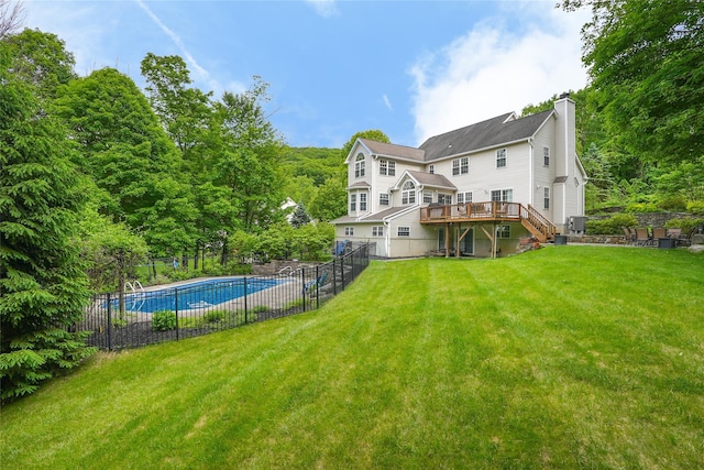 27 Millstream Ct, Pawling, NY 12564 - back of property with stairs, a wooden deck, and a chimney