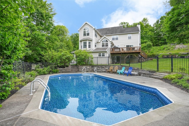 27 Millstream Ct, Pawling, NY 12564 - view of swimming pool with stairs, a wooden deck, and a patio