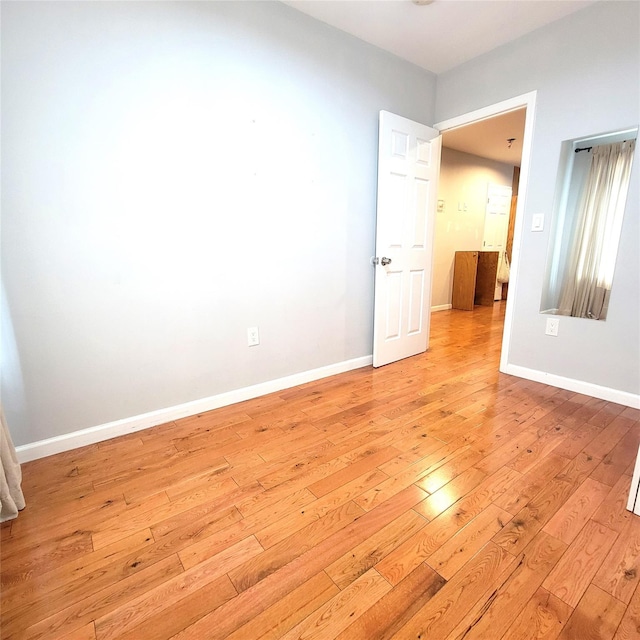 40-19 68th St, Woodside, NY 11377 - empty room featuring light wood-type flooring and baseboards