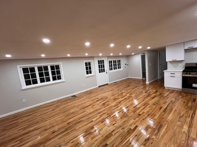 2411 Goshen Tpke, Middletown, NY 10941 - unfurnished living room featuring light wood finished floors, baseboards, and recessed lighting