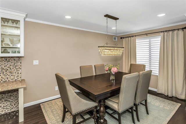 99 S Park # 308, Rockville Centre, NY 11570 - dining room featuring crown molding, dark wood-style flooring, baseboards, recessed lighting, and a chandelier