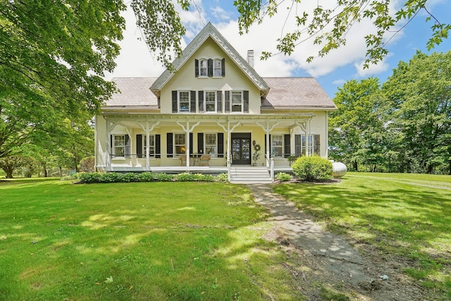 90 Main St, Chester, NY 10918 - view of front of house with a porch, a chimney, and a front yard