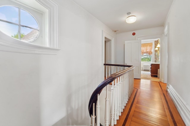 90 Main St, Chester, NY 10918 - hall with an upstairs landing, radiator, and light wood-style flooring