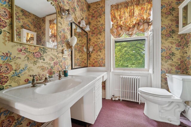 90 Main St, Chester, NY 10918 - bathroom with radiator heating unit, wallpapered walls, and toilet