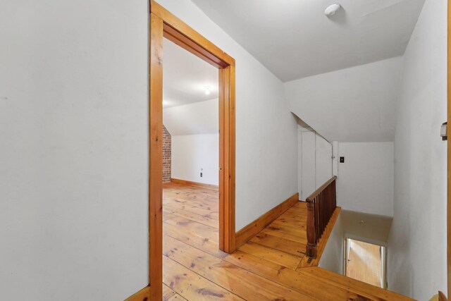 90 Main St, Chester, NY 10918 - staircase with vaulted ceiling, hardwood / wood-style floors, and baseboards