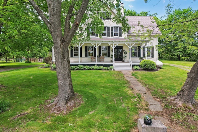 90 Main St, Chester, NY 10918 - view of front of home featuring covered porch and a front lawn