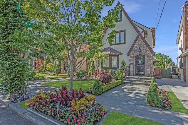 148-03 9th Ave, Whitestone, NY 11357 - tudor home featuring stone siding and stucco siding