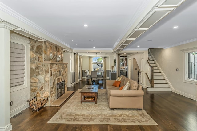 148-03 9th Ave, Whitestone, NY 11357 - living room with healthy amount of natural light, stairs, wood finished floors, ornamental molding, and a stone fireplace