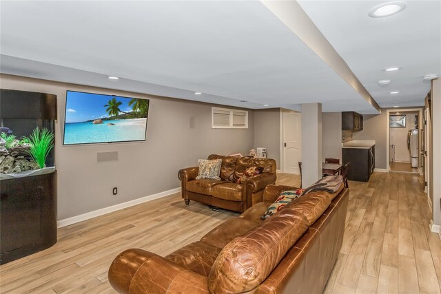 148-03 9th Ave, Whitestone, NY 11357 - living room with light wood-style flooring, baseboards, washer / clothes dryer, and recessed lighting