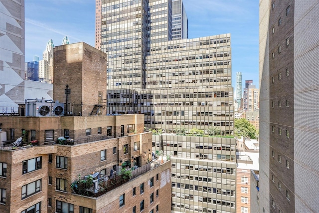 211 E 46th St Unit 14E, New York Manhattan, NY 10017 - view of property with a city view