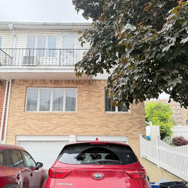 149-45 83rd St, Howard Beach, NY 11414 - view of front of property featuring brick siding and an attached garage