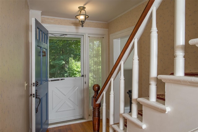 36 Elm St, Pawling, NY 12564 - entryway featuring wallpapered walls, wood finished floors, and crown molding