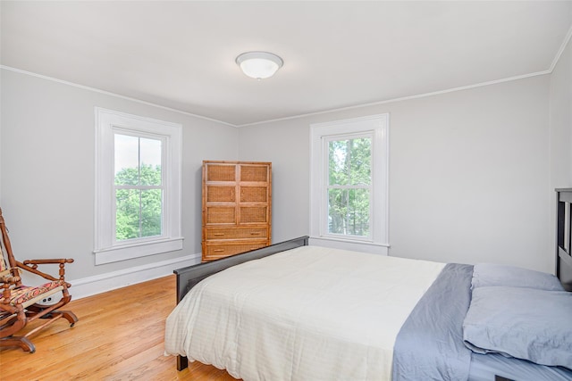 36 Elm St, Pawling, NY 12564 - bedroom featuring wood finished floors, ornamental molding, multiple windows, and baseboards