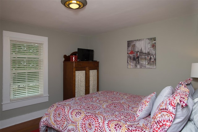 36 Elm St, Pawling, NY 12564 - bedroom featuring wood finished floors, multiple windows, and baseboards