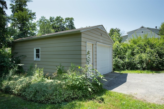36 Elm St, Pawling, NY 12564 - detached garage featuring driveway