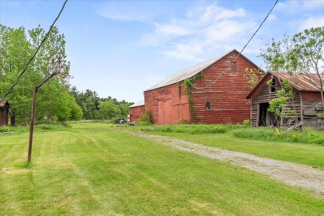 4248 Western Tpke, Call Listing Agent, NY 12009 - view of green lawn featuring a barn and an outdoor structure