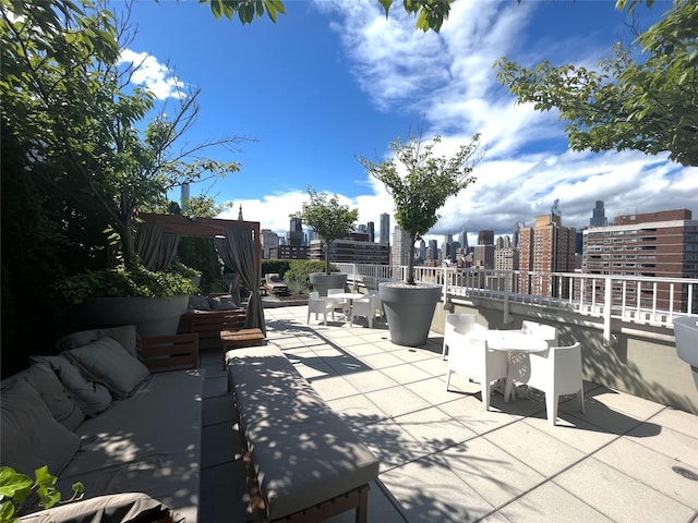 340 E 23rd St Unit 4L, New York Manhattan, NY 10010 - view of patio with a view of skyline and a pergola
